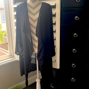 Trouvé duster size small.